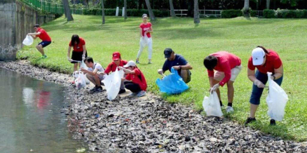 Toshiba employees raising awareness of water conservation through a clean-up activity