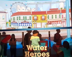 Children from Sunbeam Place interacting with the exhibits at the NEWater Visitor Centre